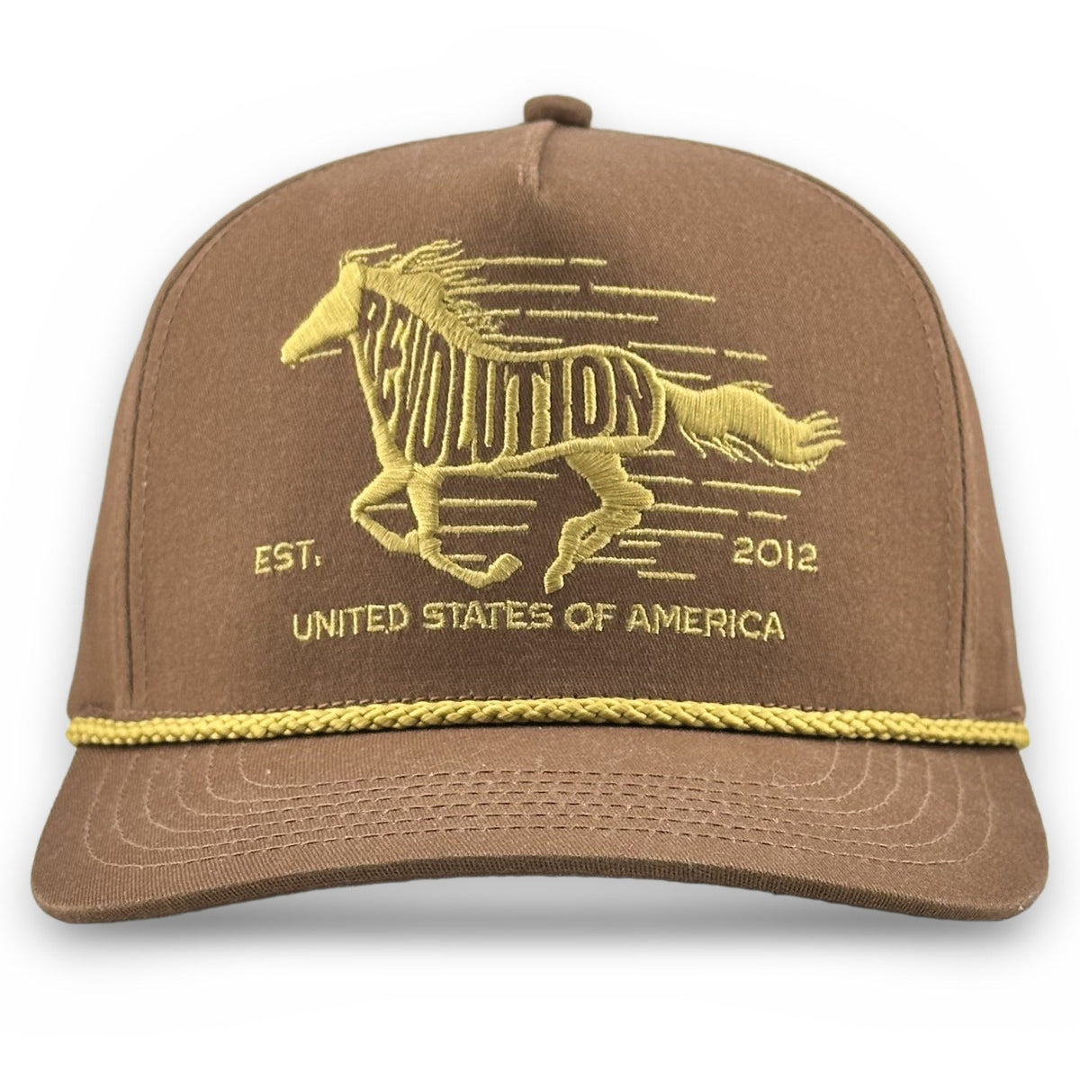 A brown baseball cap with a gold embroidered running horse logo and the text 'REVOLUTION' and 'UNITED STATES OF AMERICA' on the front, plus a gold braided trim along the brim, shown on a white background.