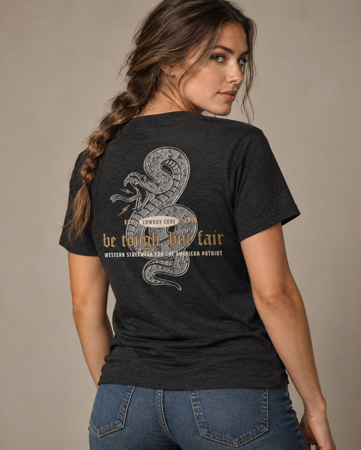 Female model in Cowboy Code #5 Be Tough, But Fair tee, Charcoal-Black, Cowboy Revolution