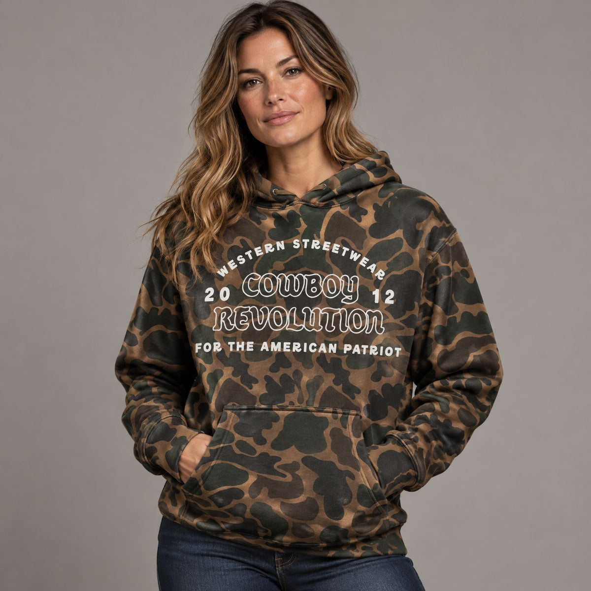 Western Streetwear Logo Camo Heavyweight Hoodie worn by female model in studio
