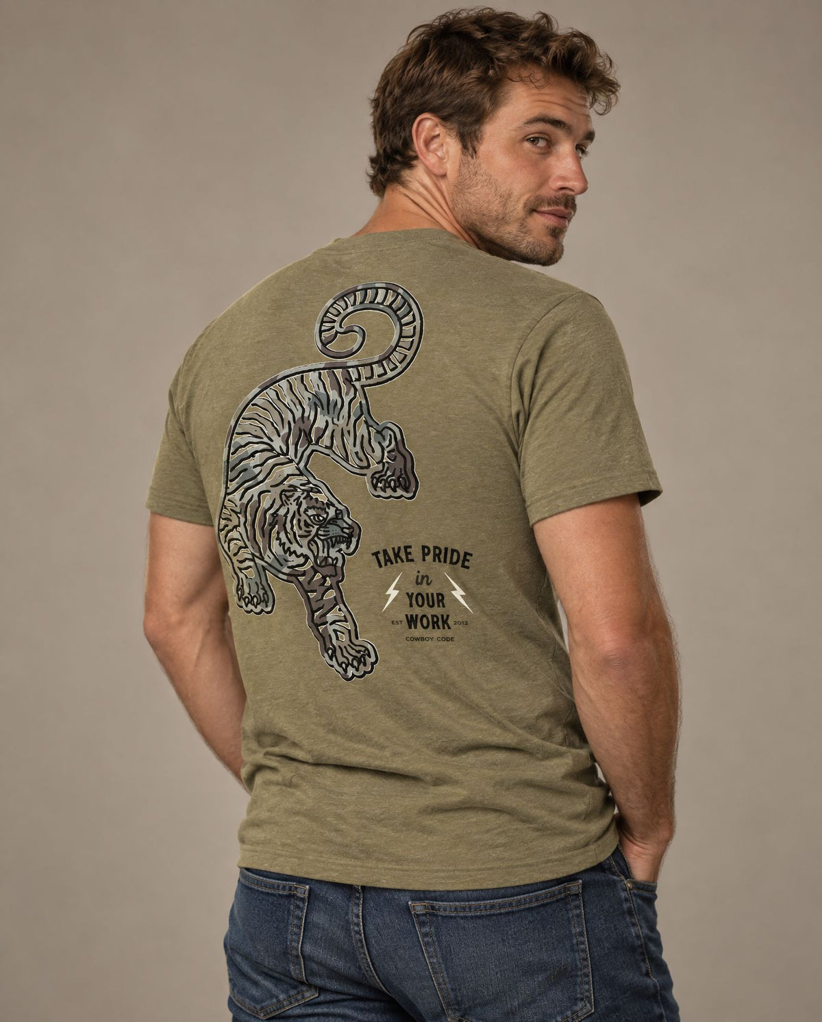 Male model in Cowboy Code #2 Take Pride in Your Work tee, Olive, Cowboy Revolution