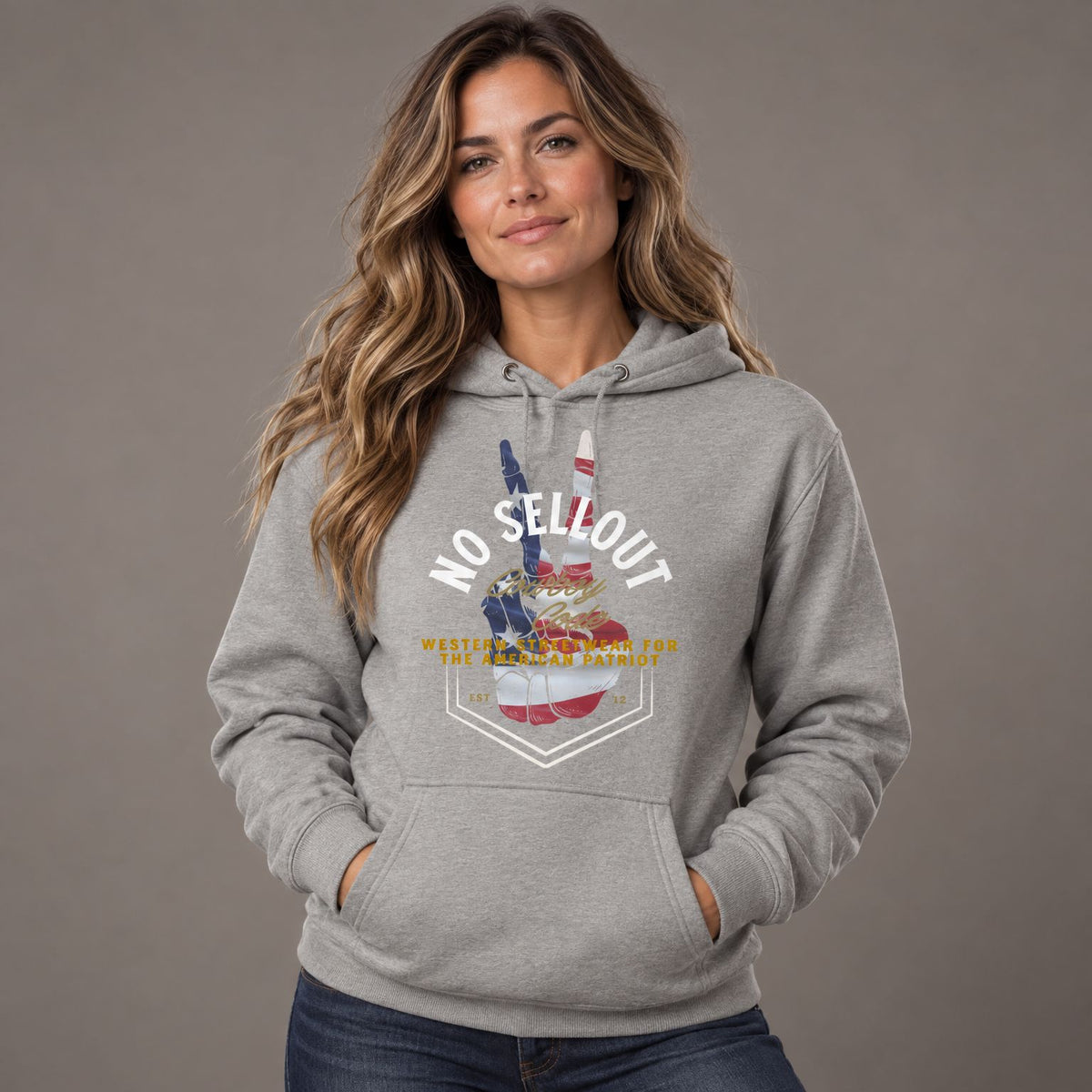 Cowboy Code #9 No Sellout hoodie worn by female model in studio