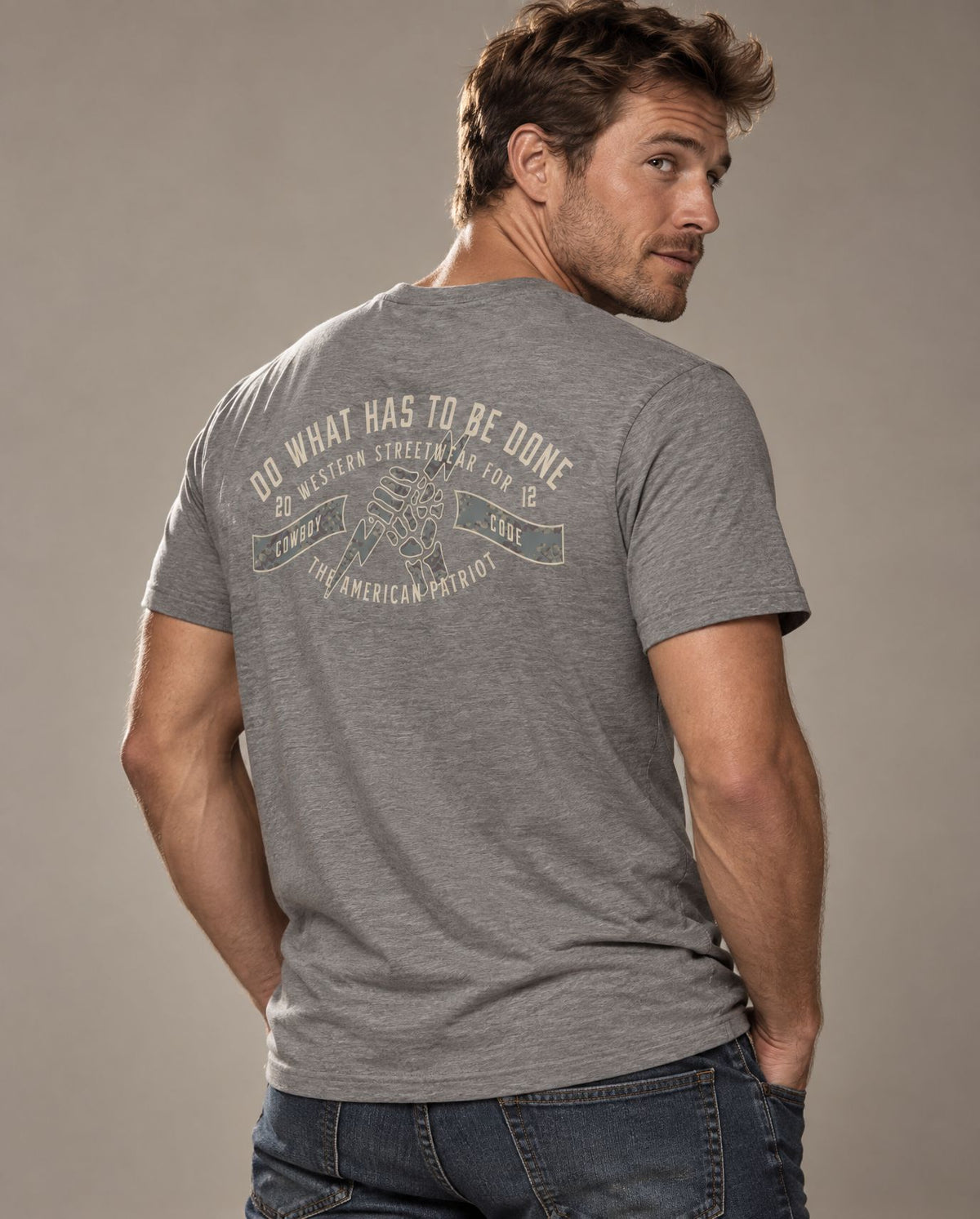 Male model in Cowboy Code #4 Do What Has to Be Done tee, Grey, Cowboy Revolution