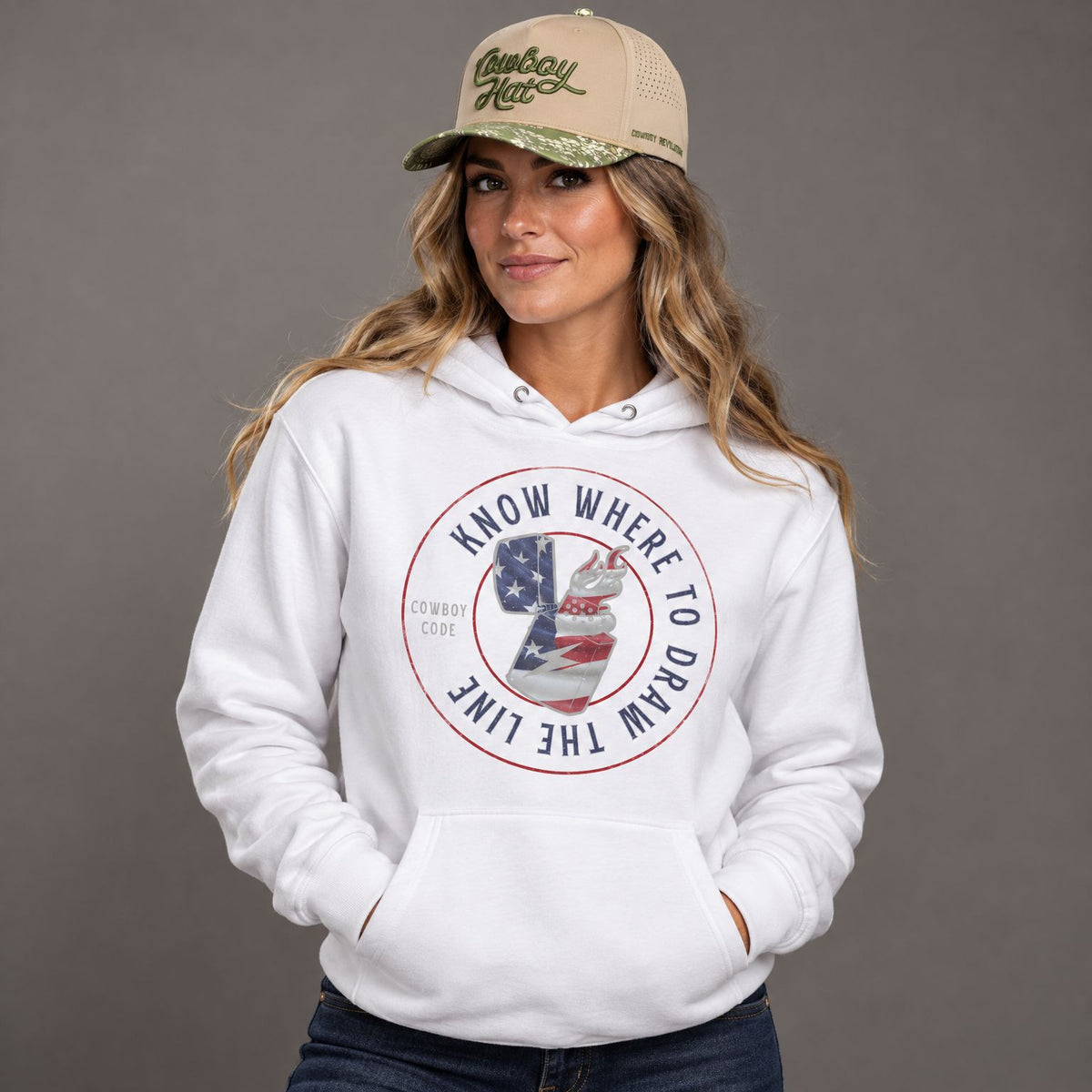 Cowboy Code #10 Draw the Line hoodie worn by female model in studio, with Cowboy Revolution Viper Duck Cowboy Hat